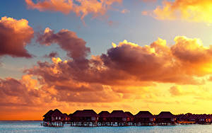 Hintergrundbilder Malediven Tropen Sonnenaufgänge und Sonnenuntergänge Himmel Bungalow Wolke