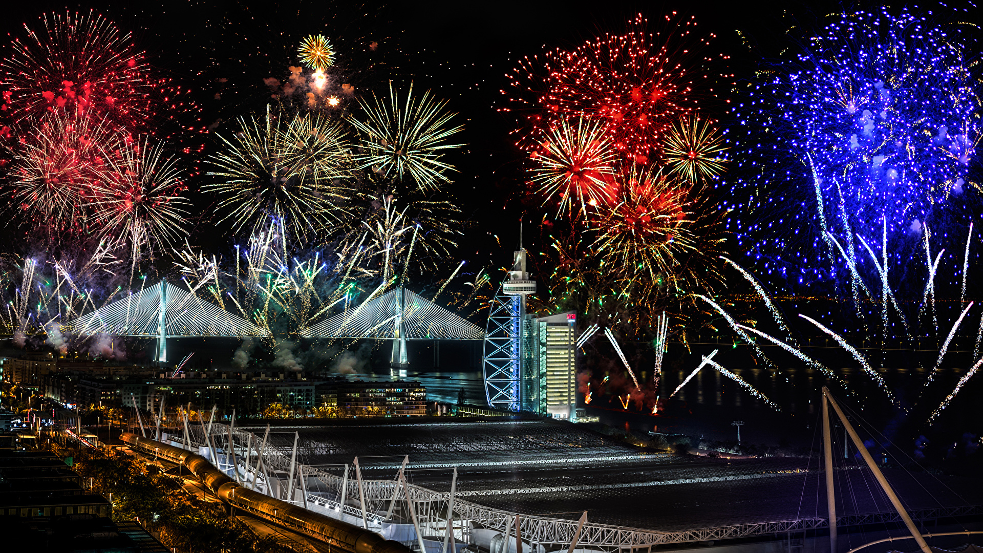 壁紙 19x1080 花火 橋 ポルトガル リスボン Lisbon Vasco Da Gama 夜 都市 ダウンロード 写真