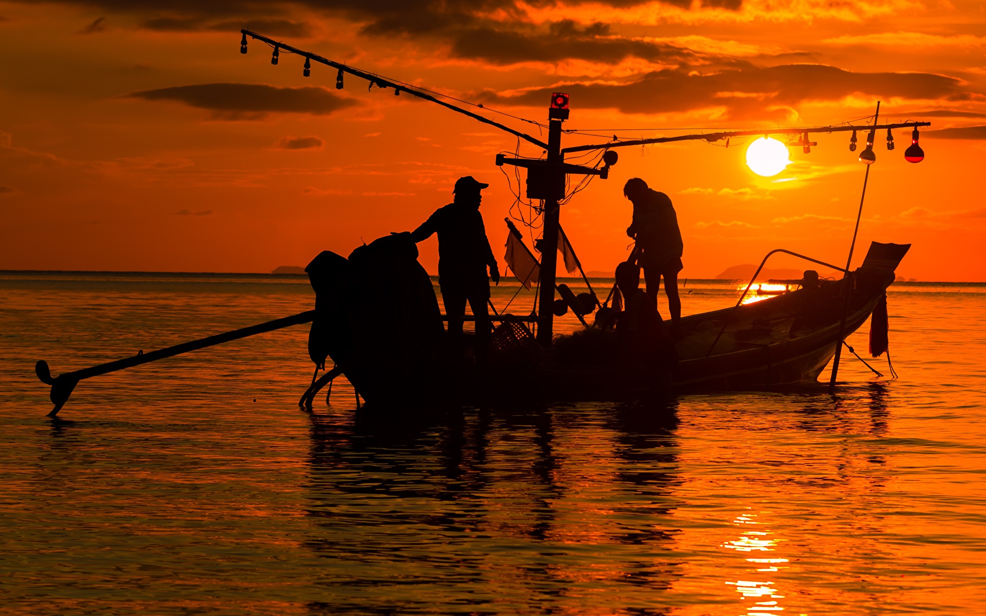 Fondos de Pantalla 1920x1200 Amaneceres y atardeceres Mar Barcos Varón