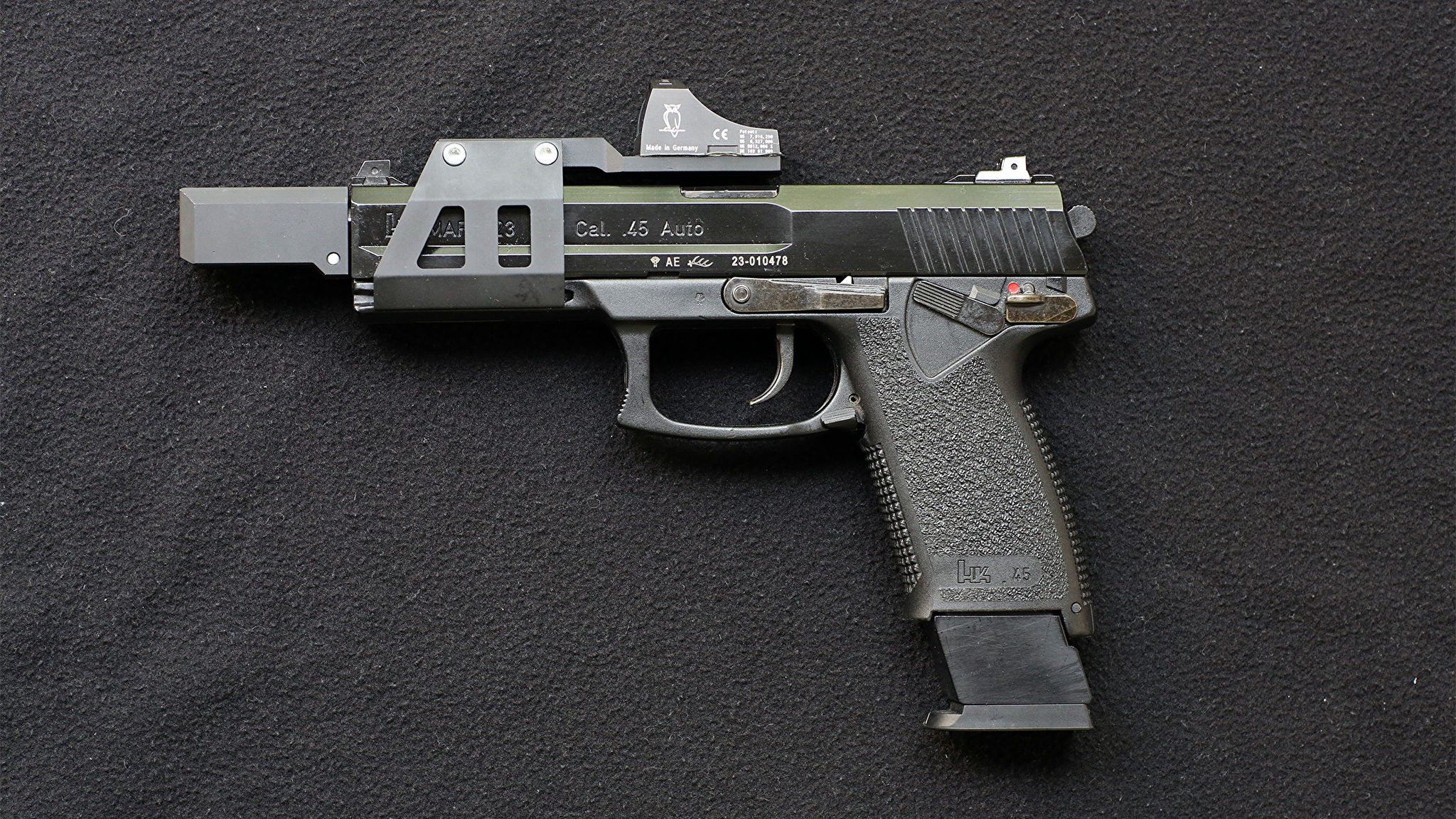 Heckler koch. Хеклер и Кох Марк 23. Mark23 Heckler. Heckler Koch оружие. Хеклер Кох пистолет.