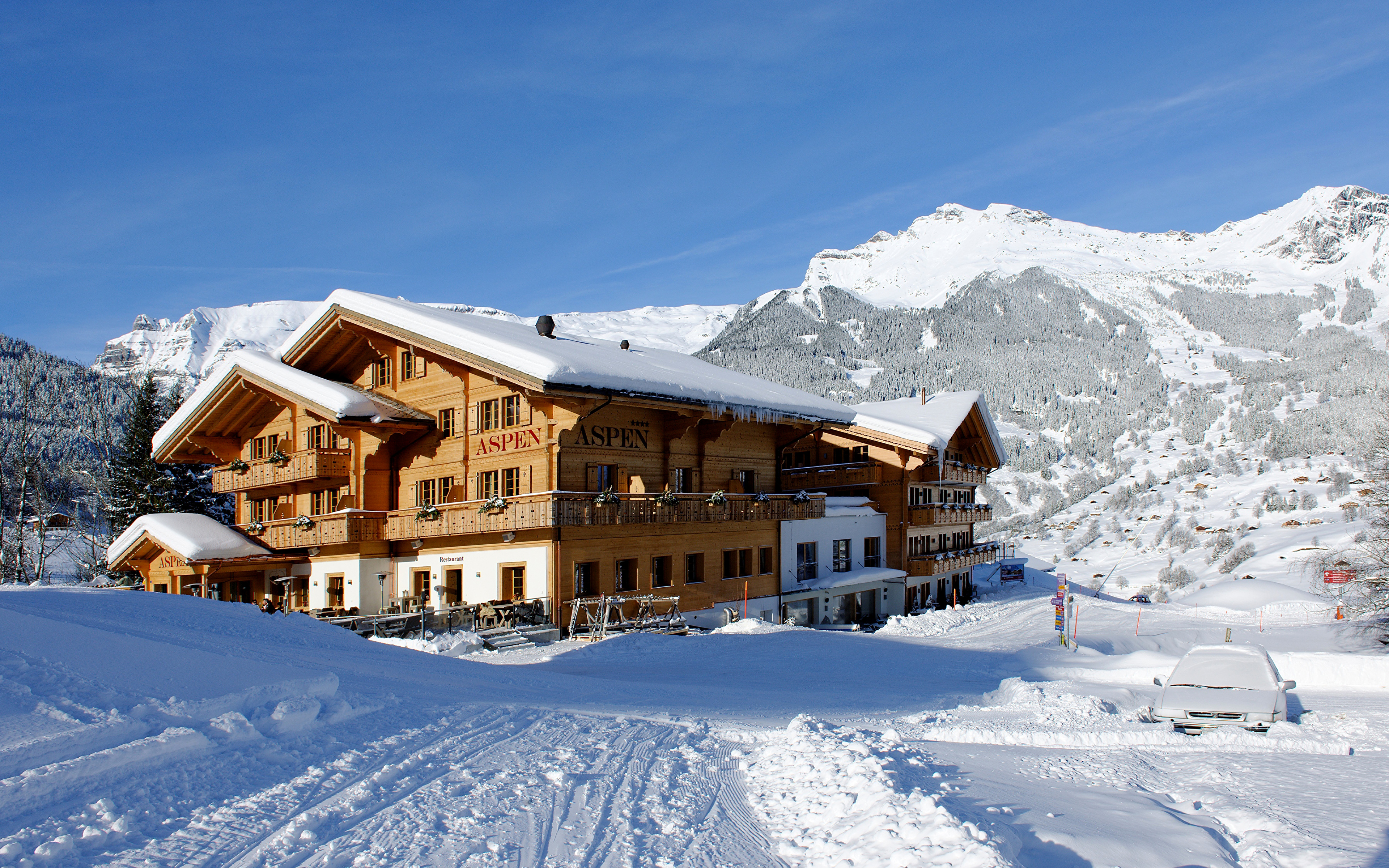 Снег на горнолыжных курортах. Аспен Швейцария. Швейцария Гриндельвальд зима. Гриндельвальд Швейцария отель Aspen. Долина Лаутербруннен Швейцария.