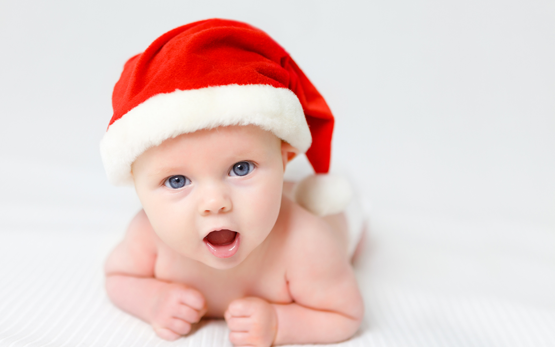 Picture Baby Christmas child Winter hat Staring 1920x1200