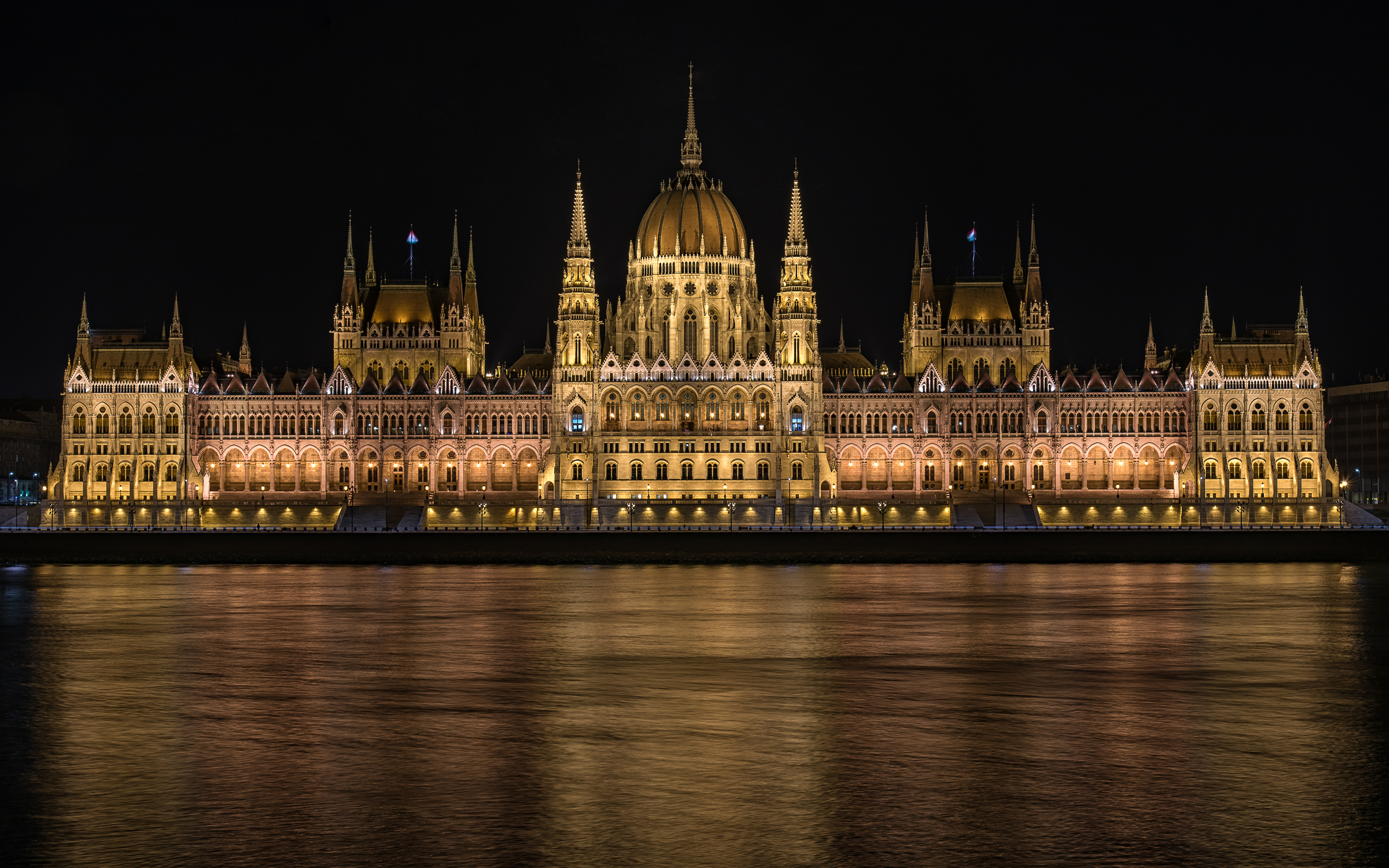 Photo Budapest Hungary Hungarian Parliament river night time Houses Cities Design 3840x2400 Night Rivers Building