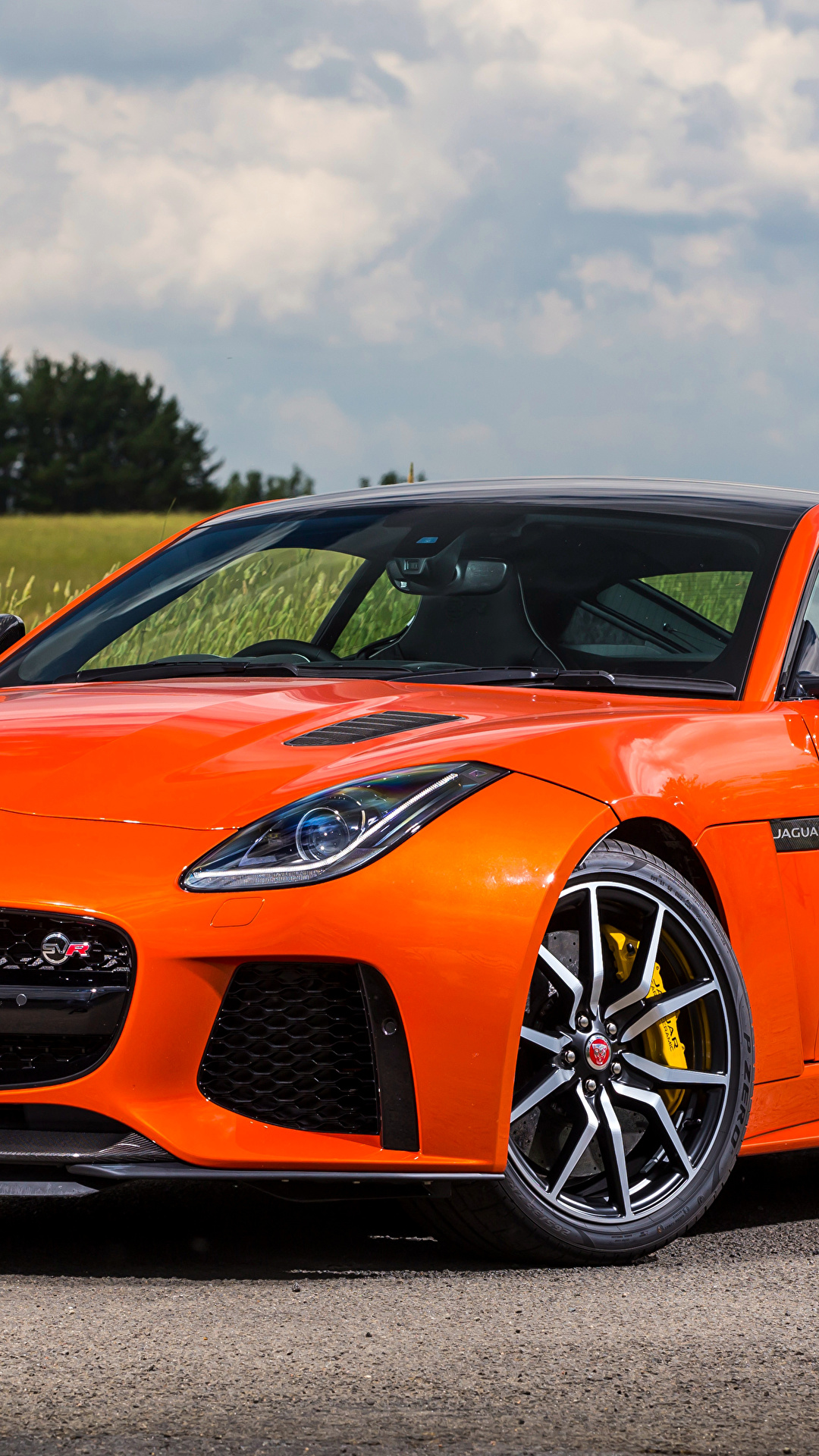 Фотография Jaguar 2016 F-Type SVR оранжевые машина 1080x1920