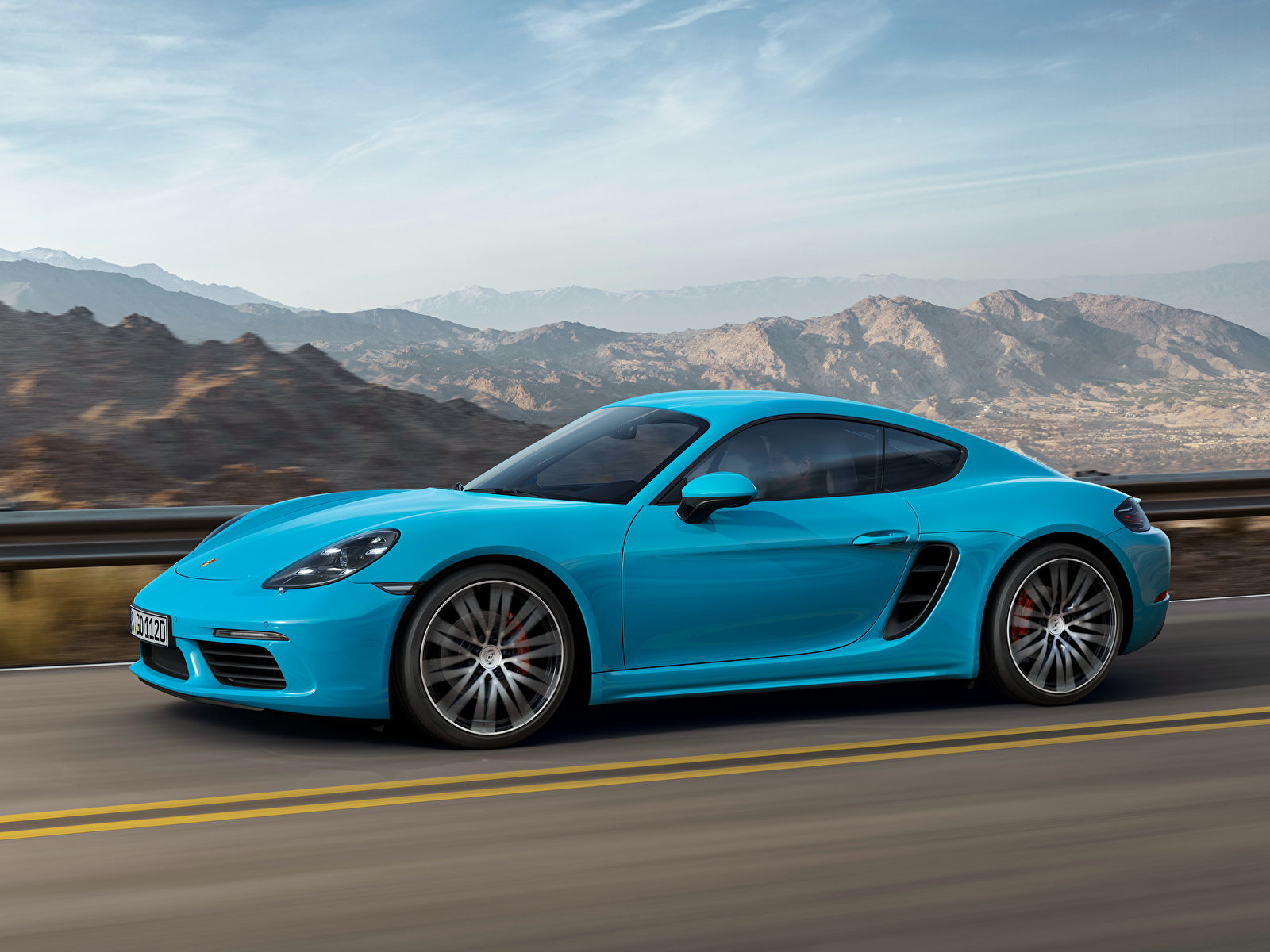 Картинка Porsche Cayman голубые Движение Сбоку автомобиль 1600x1200