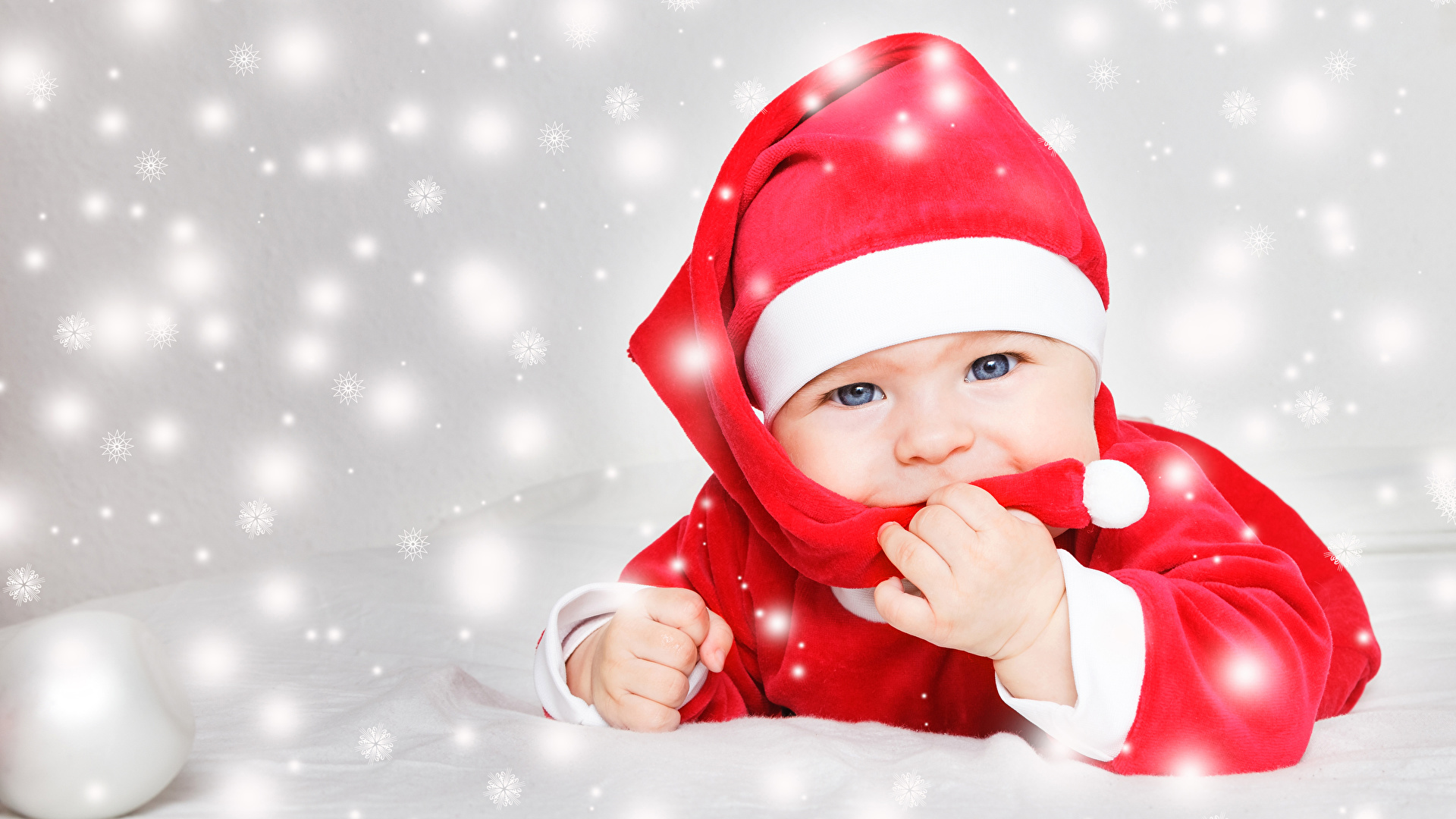 Image newborn Christmas child Winter hat Snowflakes Glance 1920x1080