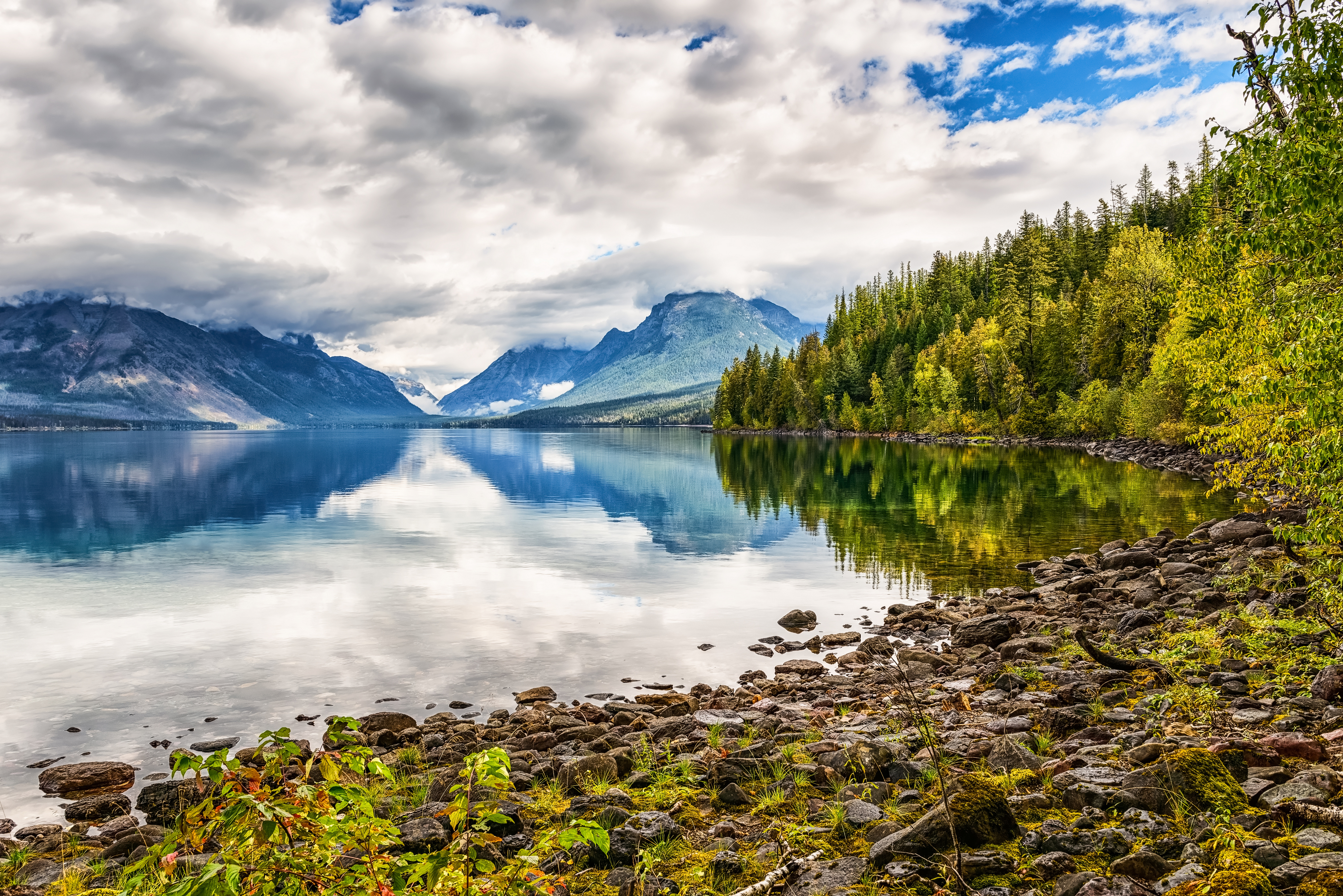 Bilder Vereinigte Staaten Lake McDonald, Glacier National Park Natur Gebirge See Landschaftsfotografie Wolke Bäume USA Berg Parks