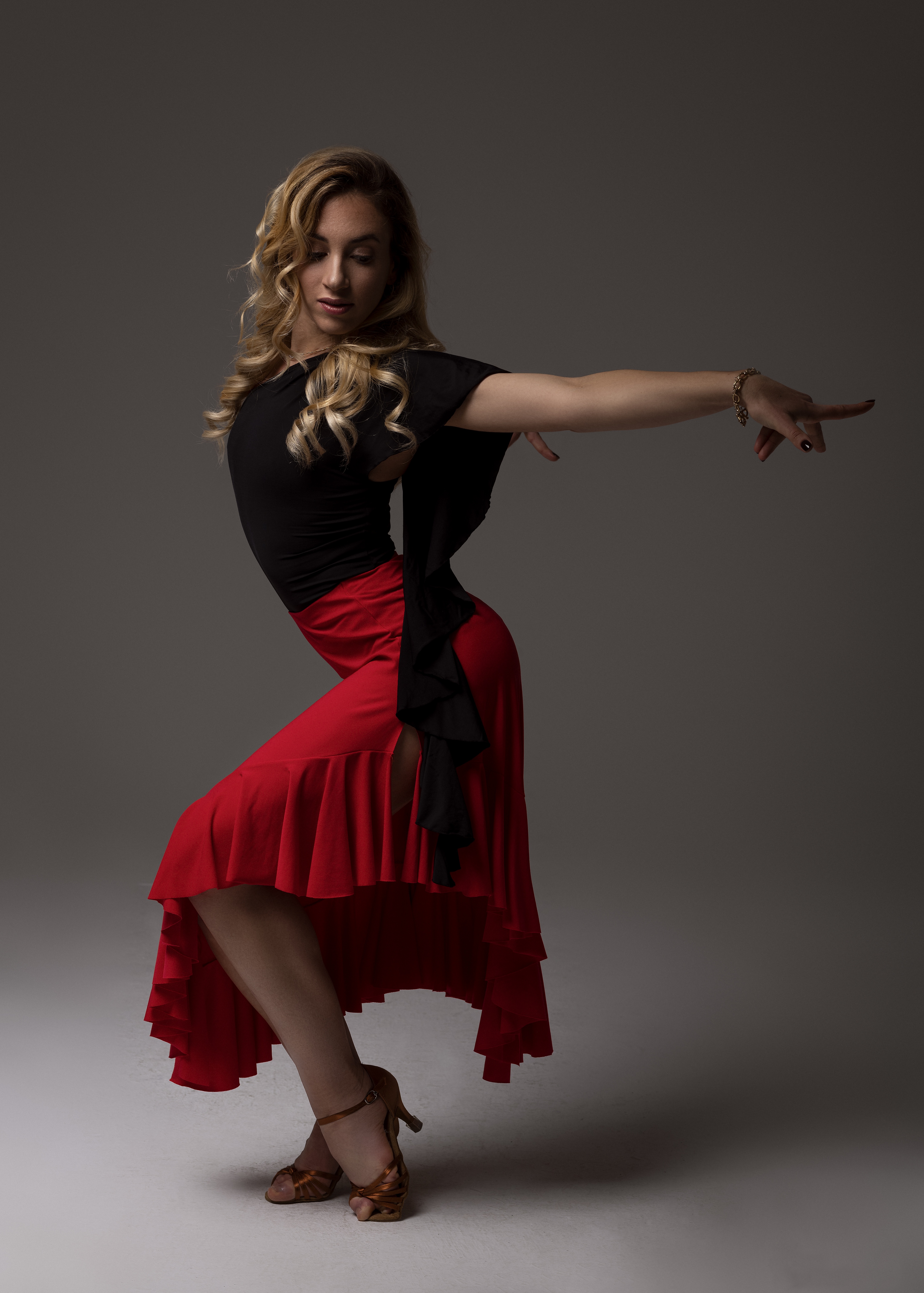 Zoomed woman hands pose in spanish flamenco dance - Stock Image - Everypixel