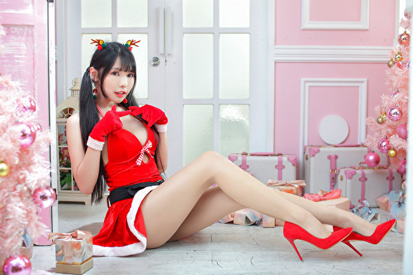 Photo Asian Christmas Brunette girl Pose Sitting Legs Pantyhose High heels Dress female